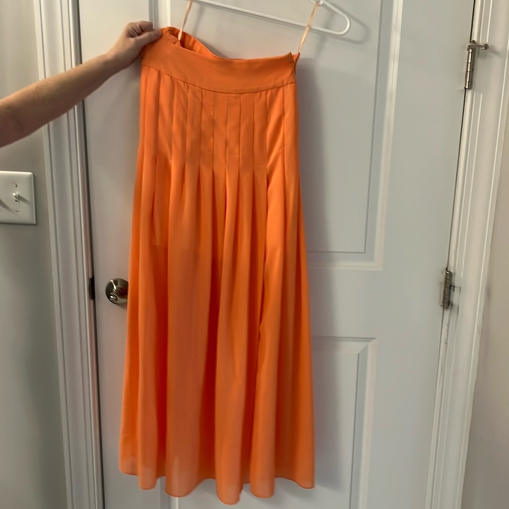 Peachy orange silk flowy pleated  skirt size M by Maeve from Anthropologie